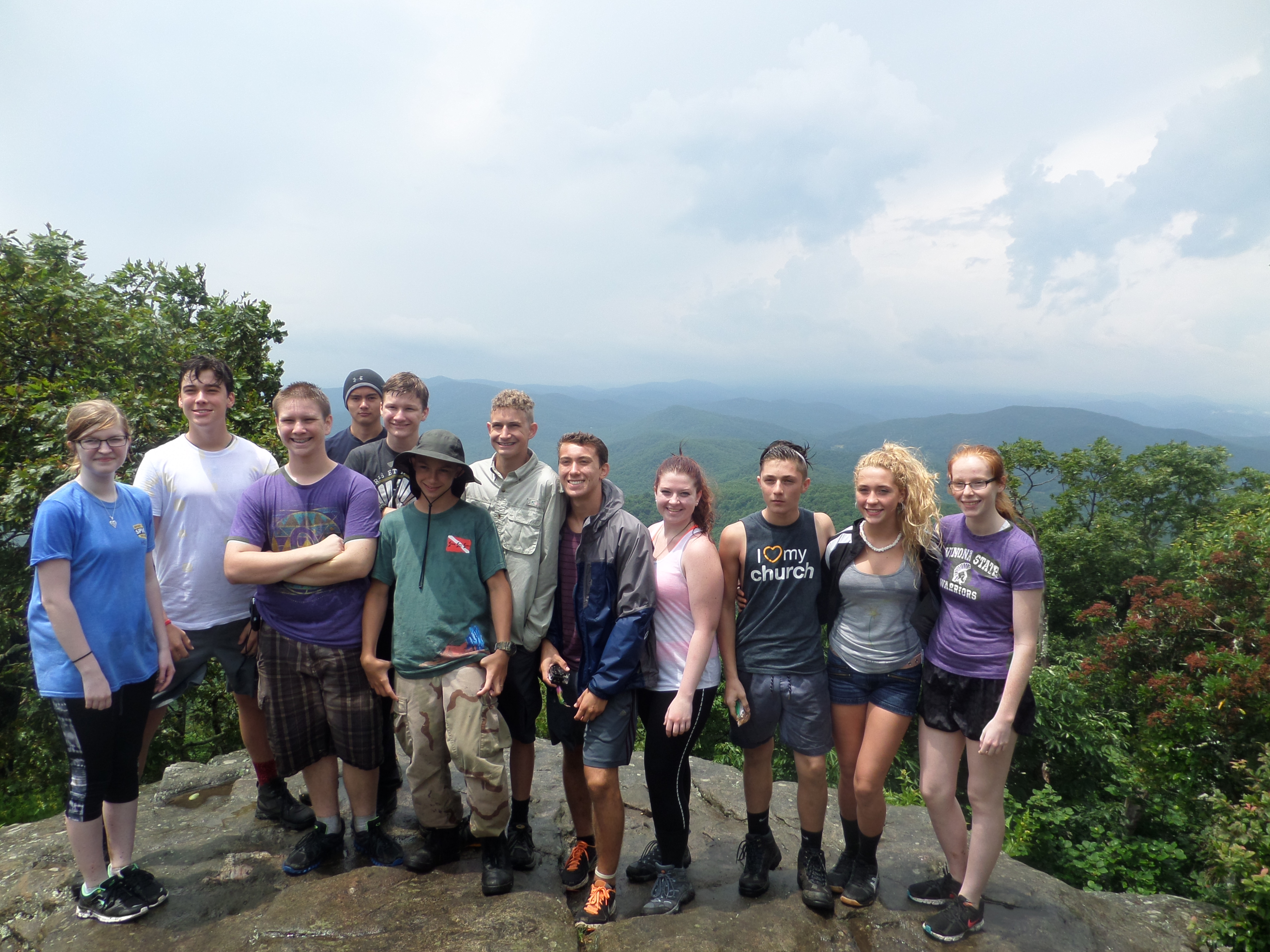 Campers on mountaintop in backpack trip